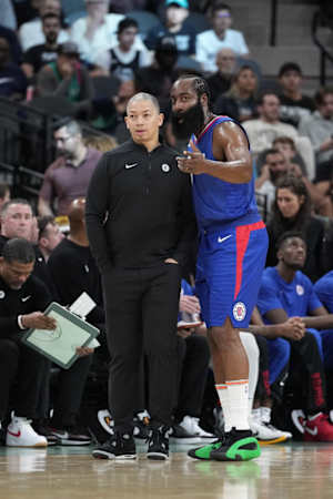 Nov 20, 2023; San Antonio, Texas, USA; LA Clippers head coach Tyronn Lue talks with guard James Harden (1) in the first half against the San Antonio Spurs at the Frost Bank Center.